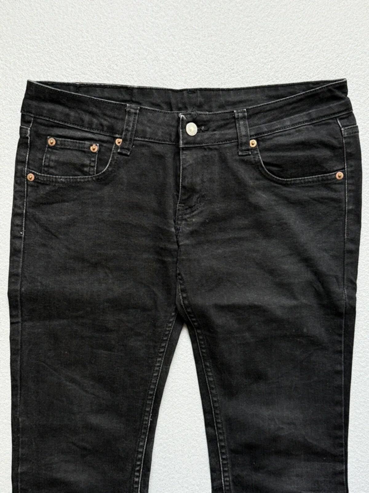 Levi’s 557 Low Rise Bootcut Black Ladies Jeans 30”